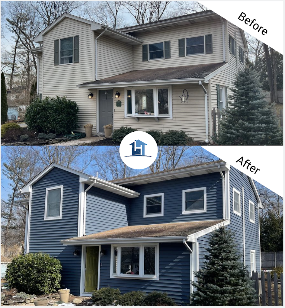 After — colonial with bold navy blue siding and white trim