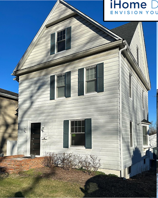 Before — colonial home with older weathered siding in Clifton, NJ