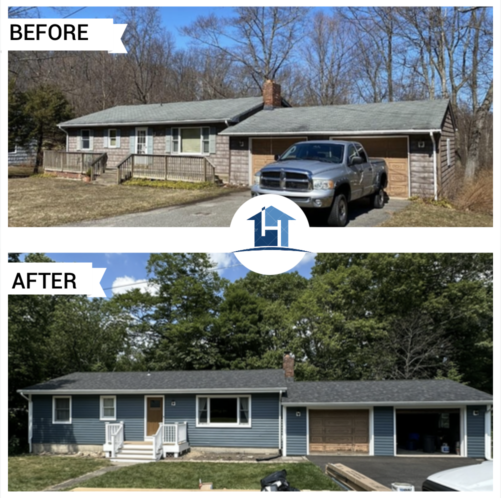 After — ranch home with new blue siding, black roof, and white porch railings